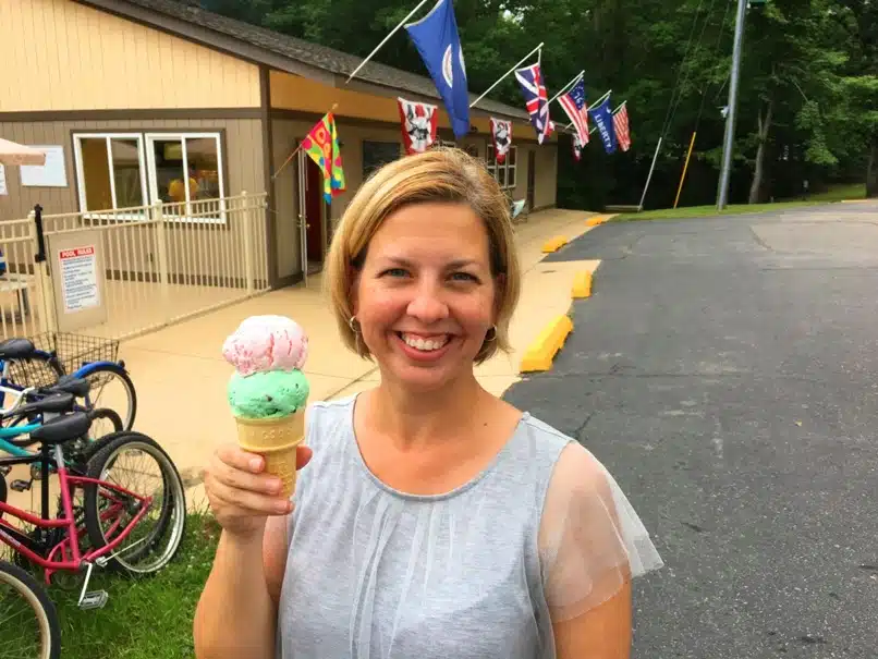 woman holding ice cream cone at RV park