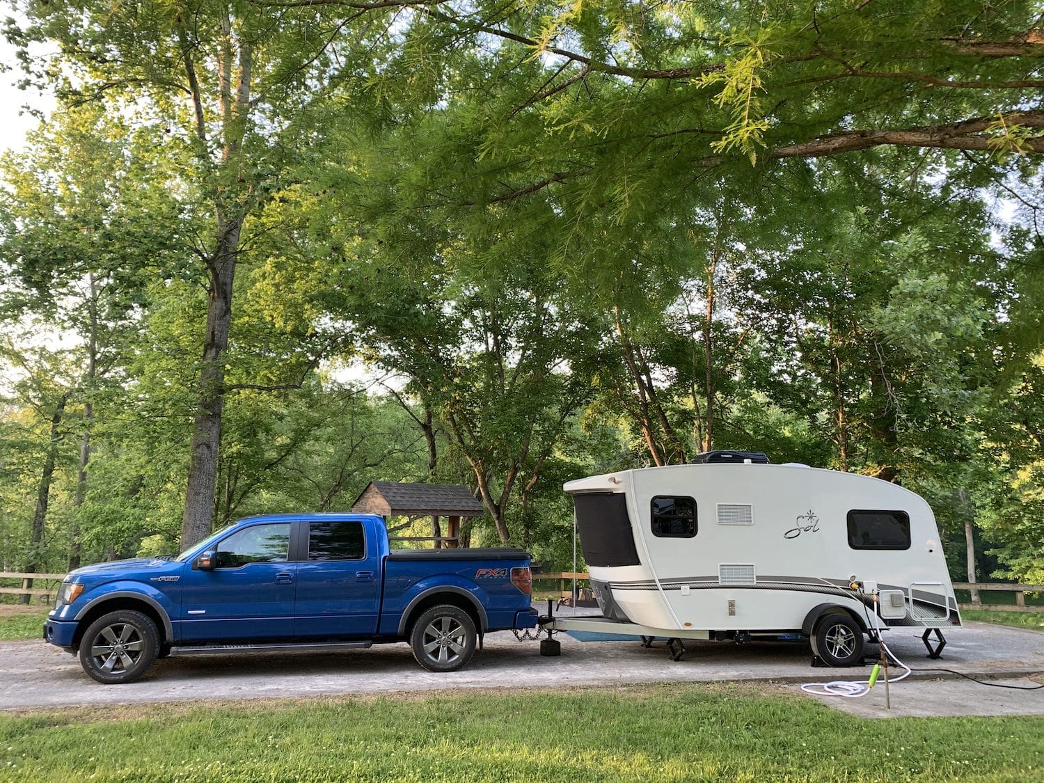 Intech sol horizon and blue truck in campsite