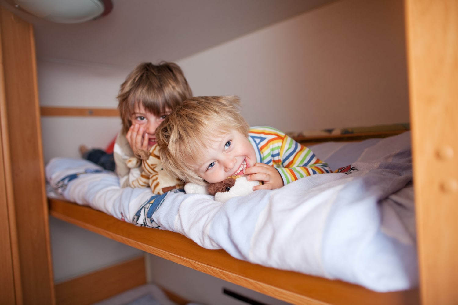 kids in an RV bunk bed