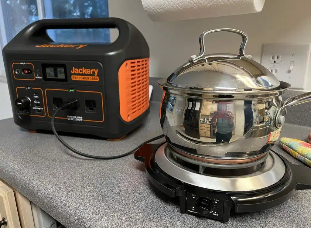 pot on a single electric burner that is plugged into a Jackery portable power station