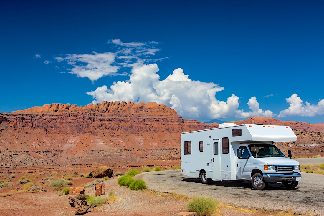 Class C RV With Desert Mountains Beyond