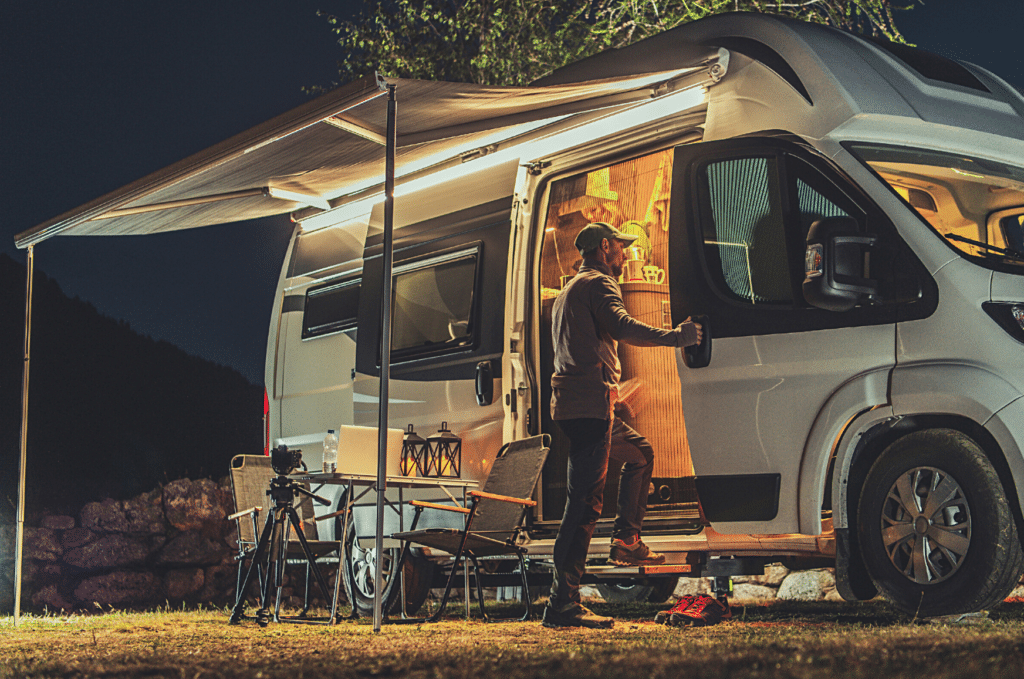 Class B RV camper van at Night in a camp Site