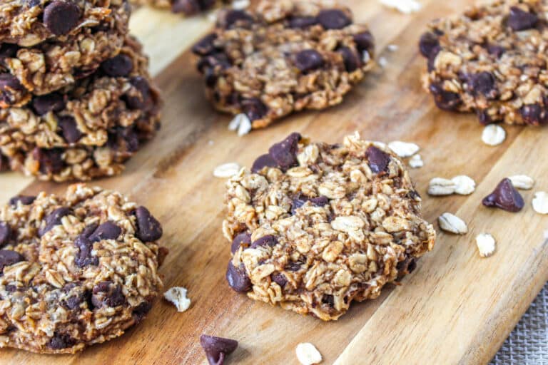 oatmeal chocolate chip breakfast cookies displayed on a wooden cutting board