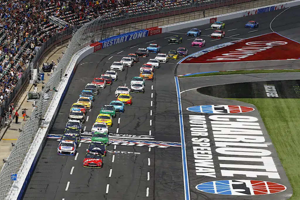 Race cars on track at the Bank of America ROVAL 400 at Charlotte Motor Speedway