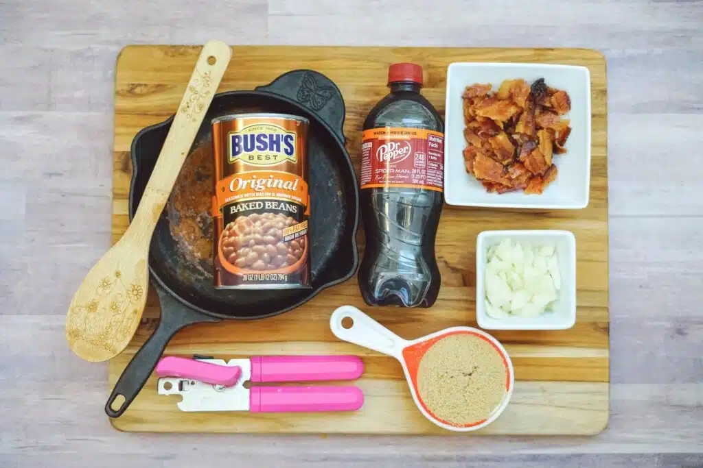 A wooden cutting board with ingredients on it.