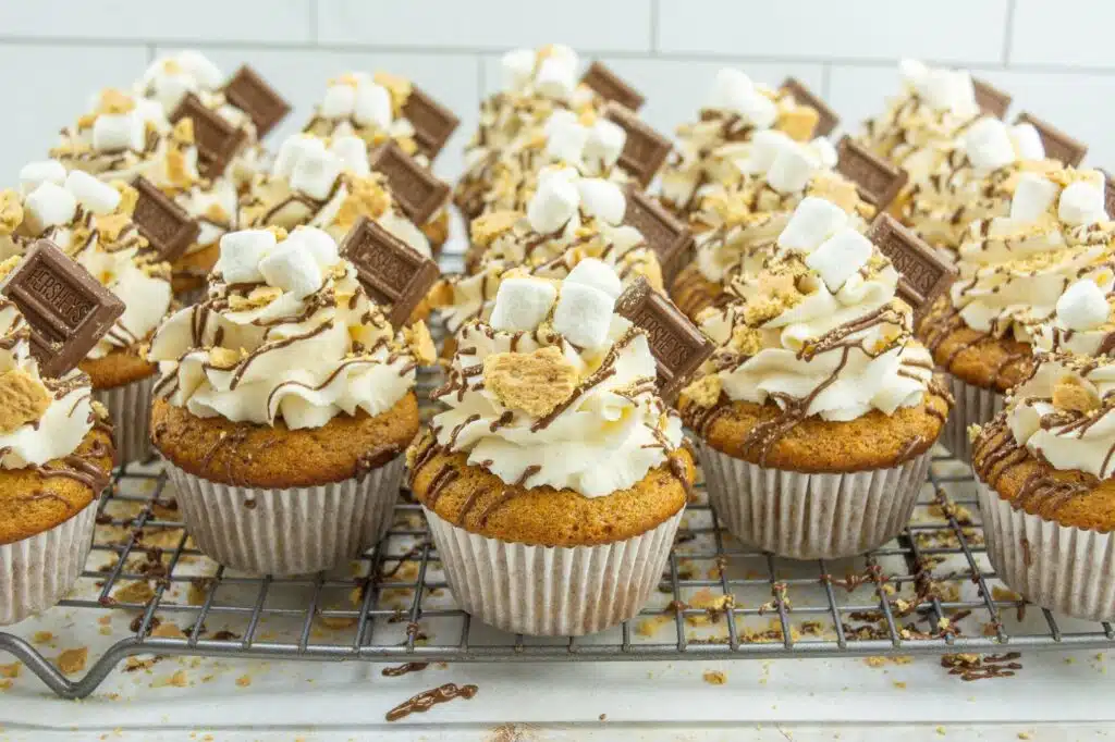 S'mores cupcakes on a cooling rack.