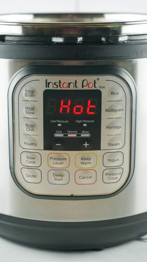 An instant pot with a digital display on it.