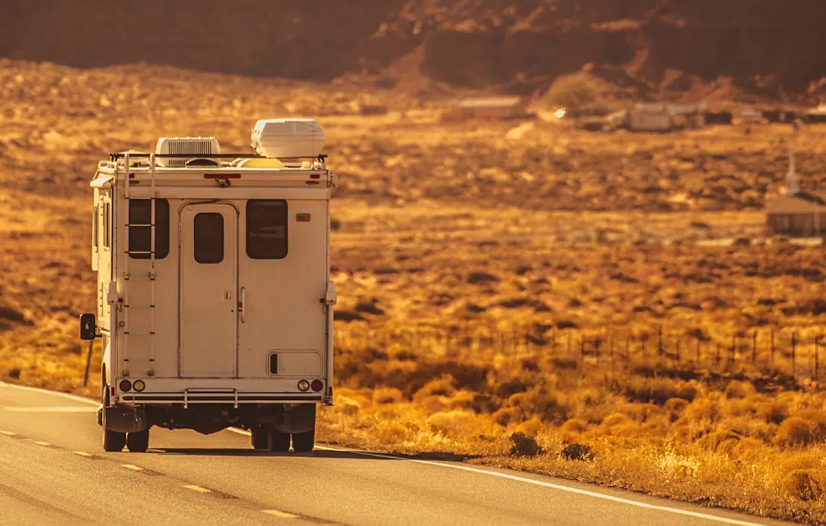 Rear of truck camper on desert road