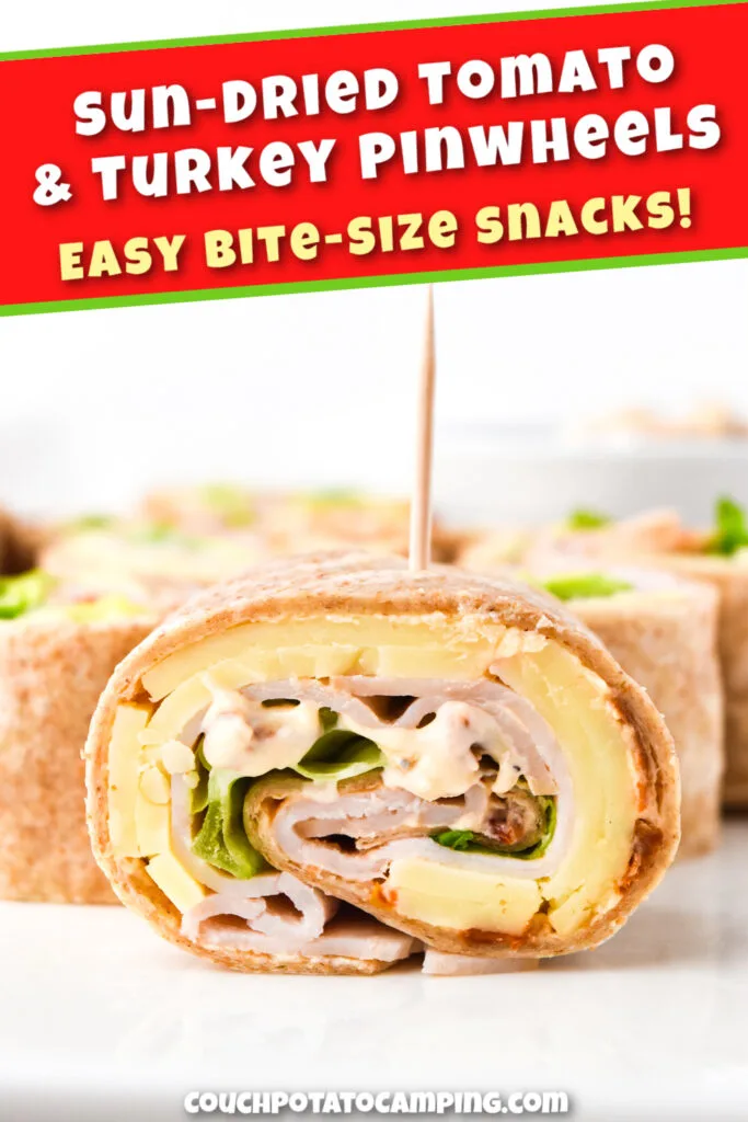 Close-up of turkey pinwheel with sun-dried tomato, layers of lettuce, cheese, and toppings. Text on image promotes them as easy bite-size snacks.